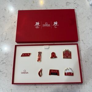 Omega Red Olympic Pin Collection